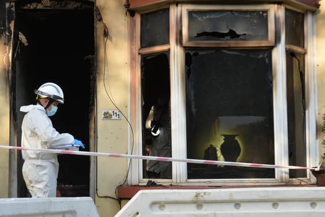 The two men were trapped inside the house until being rescued by fire crews