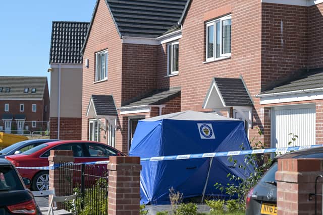 A police tent at the scene in Tangmere Road. Photo: SnapperSK