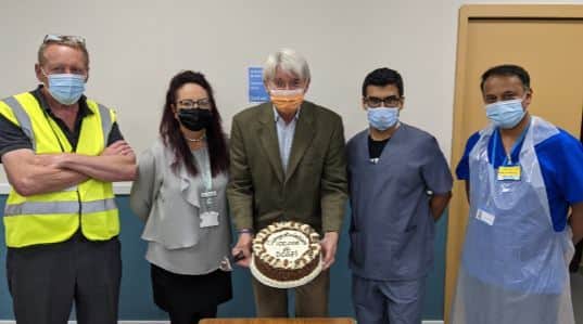 Dr Rahul Dubb, Andrew Mitchell MP and members of the vaccine team