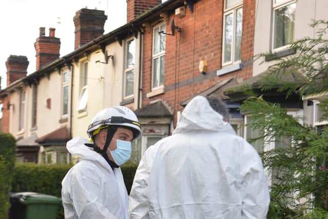 Forensic officers were at the scene to examine the house 