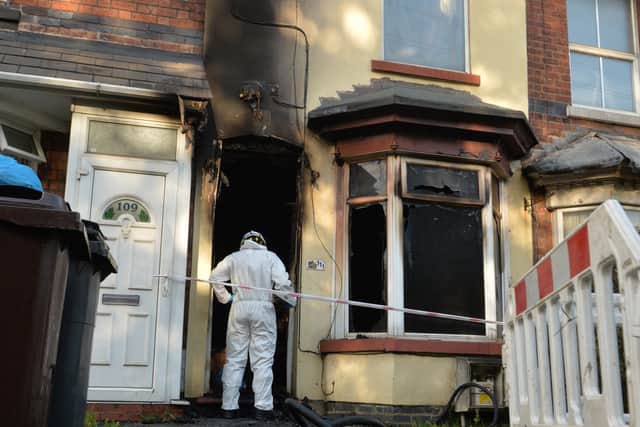 Neighbours tried to rescue the men from the house before fire crews arrived