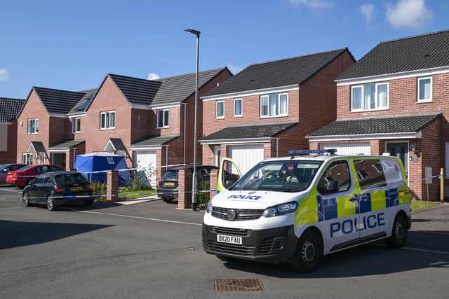 Police at the scene in Tangmere Road. Photo: SnapperSK