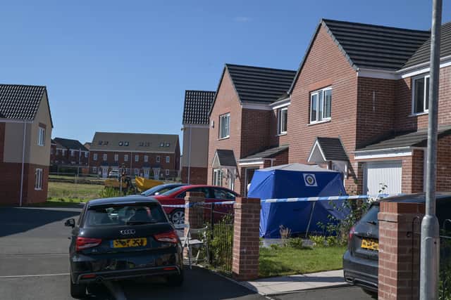Police at the scene in Tangmere Road. Photo: SnapperSK