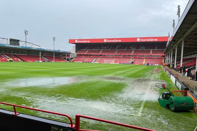 The waterlogged pitch at The Banks's Stadium