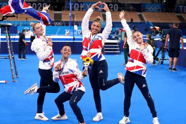 Team GB celebrate with their bronze medals