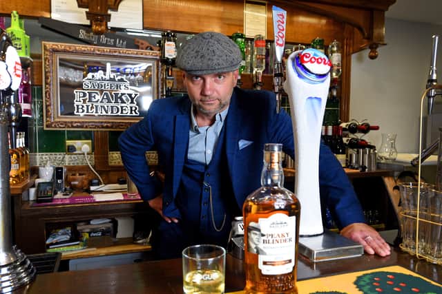 Archie Dubrov behind the bar