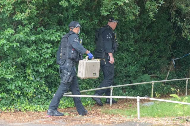 Armed police at the scene in Unett Street. Photo: SnapperSK