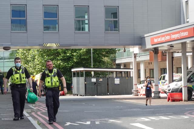 Police at the Emergency Department entrance of New Cross Hospital in Wolverhampton after a member of staff was stabbed. Photo: SnapperSK.