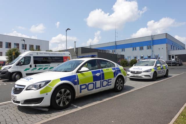 Police at the Emergency Department entrance of New Cross Hospital in Wolverhampton after a member of staff was stabbed. Photo: SnapperSK.
