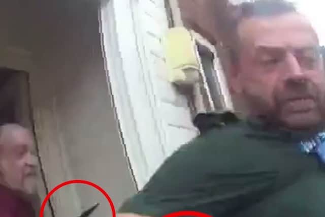 The moment Smith lunged at paramedics with knives
