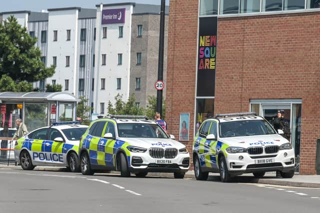 Police outside New Square Shopping Centre in West Bromwich. Photo: SnapperSK