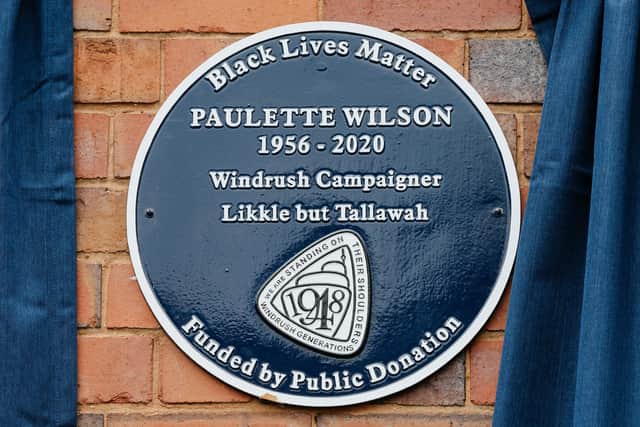 The plaque carries the phrase 'Likkle but Tallawah', a Jamaican phrase meaning 'Little, but Powerful'