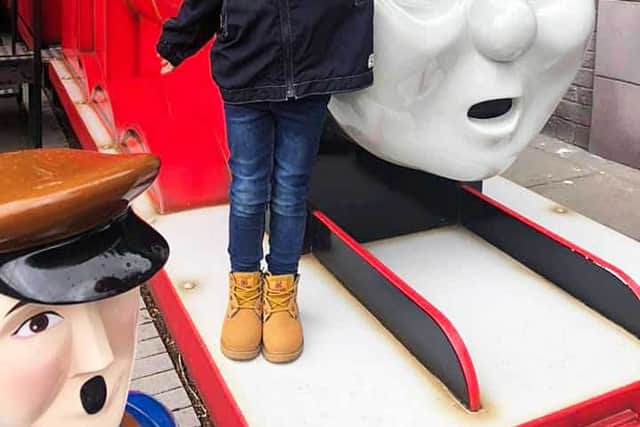 A happy visitor at Drayton Manor