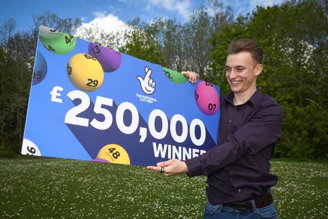 Luke Ashman is celebrating after his scratchcard win