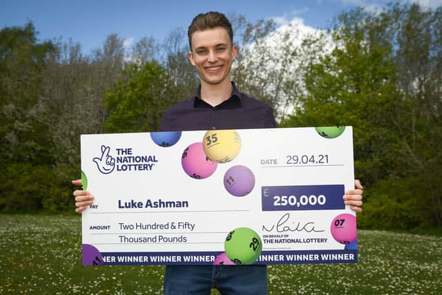 Luke Ashman is celebrating after his scratchcard win