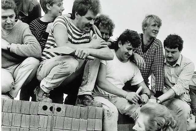 Chatting to workmen while visiting a building site at Bilston in 1987.