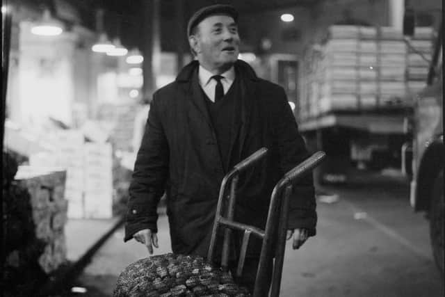 A porter during the last days of Wolverhampton's wholesale market on the site now occupied by the Civic Centre