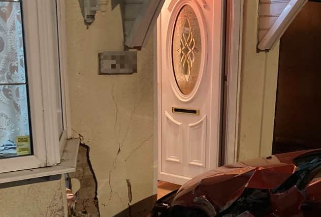The car collided with the front of the house. Photo: @WMFSStourbridge