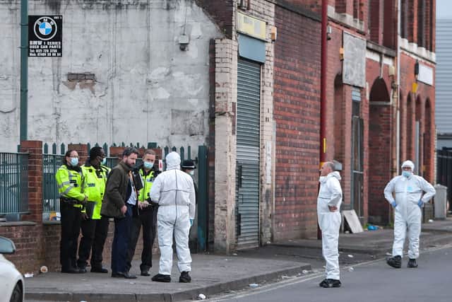 Police in Western Road, near City Hospital, where a man was shot dead. Photo: SnapperSK