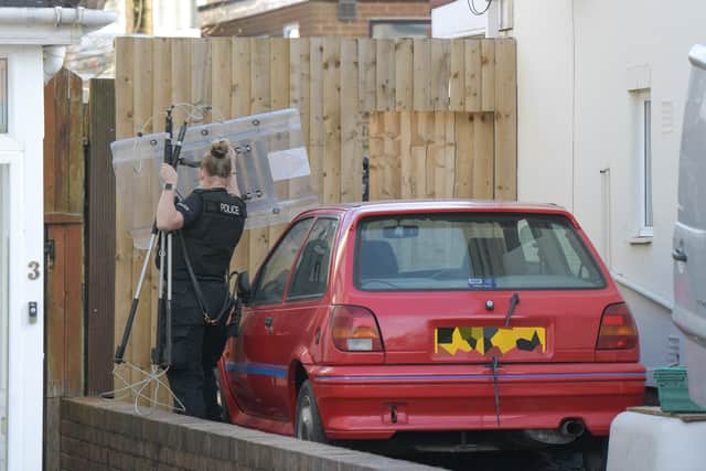 Police at the scene in Boundary Avenue. Photo: SnapperSK