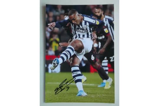 A signed Ken Zohore photo is included in the auction