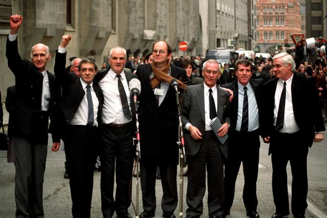 The Birmingham Six, from left, John Walker, Paddy Hill, Hugh Callaghan, Chris Mullen, Richard McIlkenny, Gerry Hunter and William Power, outside the Old Bailey, in London, after their convictions were quashed