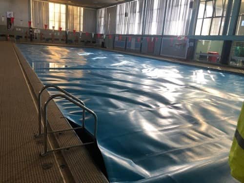 The pool has been covered over in preparation for the start of work