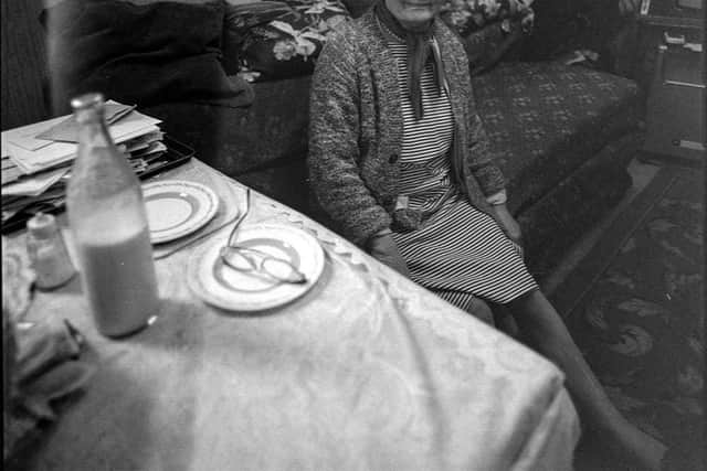 Mrs Harrington sits in her house in North Street, opposite The Feathers