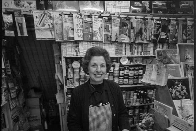 Here George captures the newsagent's