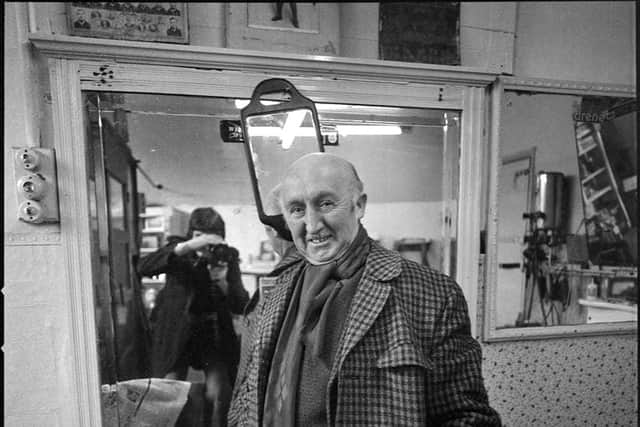 This man looks rather pleased with his new haircut