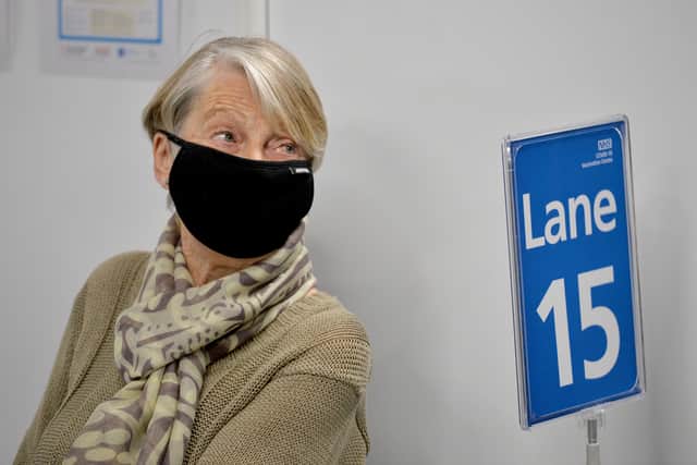 Mass vaccination centre opens at Millennium Point, Birmingham. Pictured, Rita Passey gets the jab.