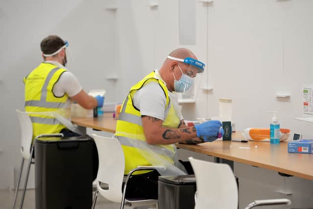 Staff at the mass testing site at the Wolverhampton Civic Centre