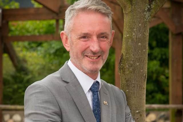 Former head David Lewis