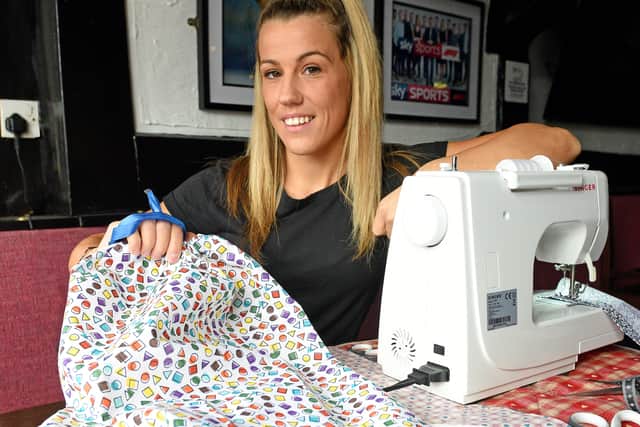 Lisa Sutherland of The Britannia Sports Bar, which is offering free hot meals