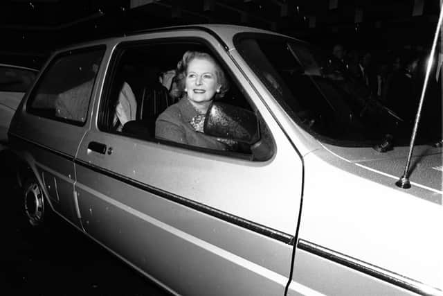 Prime Minister Margaret Thatcher drives one of the first Mini Metros into the National Exhibition Centre, Birmingham, to officially open the 1980 Motor Show