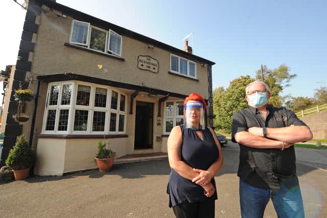 Landlady Paula-Jayne Lomas, and landlord Glen Lomas, outside the Dog & Partridge, Calf Heath 