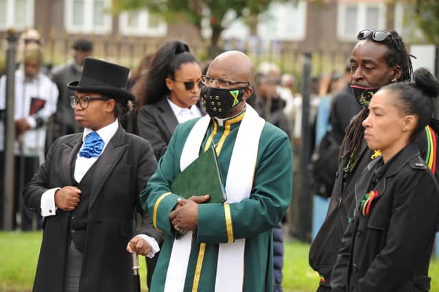 Family members and friends gathered in their masses outside the church