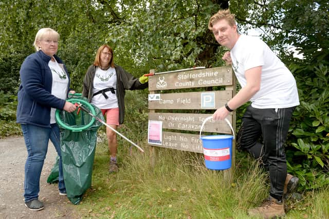 Councillor Mandy Dunnett, Chris Ellse and Stuart Haynes next to the entrance of Camp Field car park