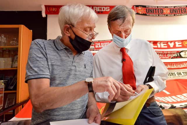 Local historian David Barratt gets an autograph off Nick Murphy, son of Jimmy Murphy (former Man Utd manager)