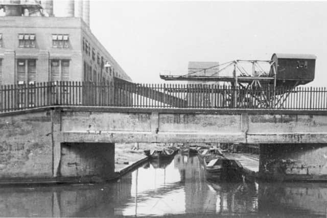 Unloading coal at the Walsall power station during the last days of canal transport in Walsall.