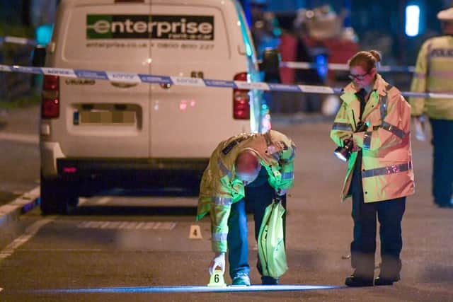 Investigators at the scene. Pic: SnapperSK