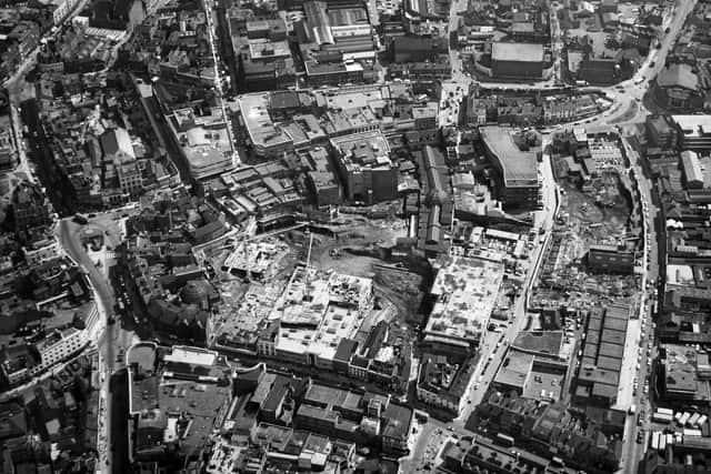 Circa 1968, an aerial view of Wolverhampton, with the Beatties store lower left, and as work on the Mander Centre is under way.