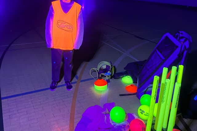 Mahnoor Qayyum with Glow cricket equipment