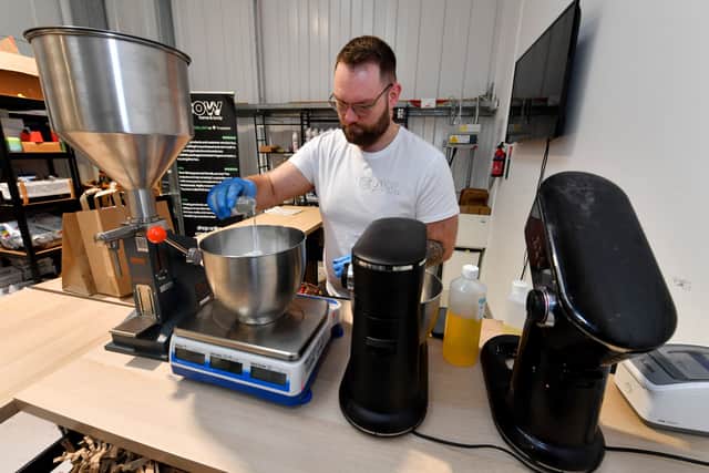 Calum makes a batch of whipped soap. Photo: Tim Thursfield