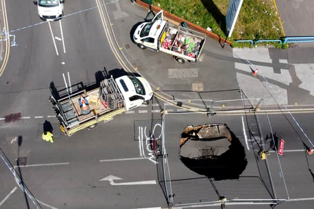 The hole is at the junction of Stafford Street and Proffitt Street next to tyre city. Photo: Tim Thursfield