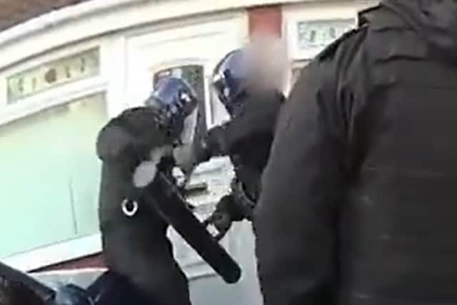 Police smashed their way in the front door during the dawn raid. Photo: West Midlands Police