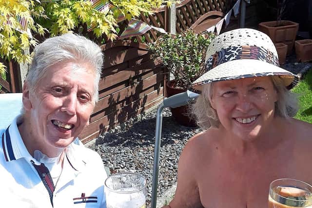 Peter George, with his wife Teresa, came out of a coma after being played messages from Albion