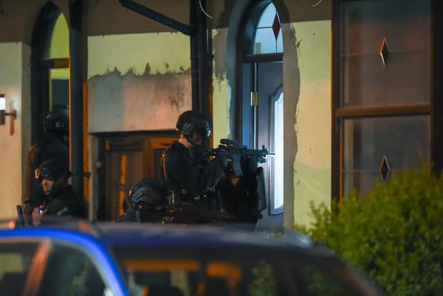 Armed police raid a house on St Paul's Road. Photo: SnapperSK