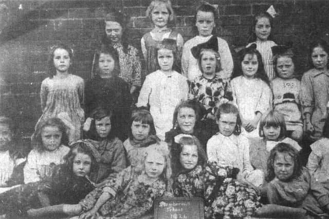 Seven-year-old Ellen, back row, right, at Stambermill Junior School in 1921