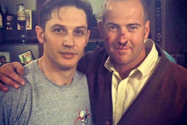 Justin with Tom Hardy on the Legend set